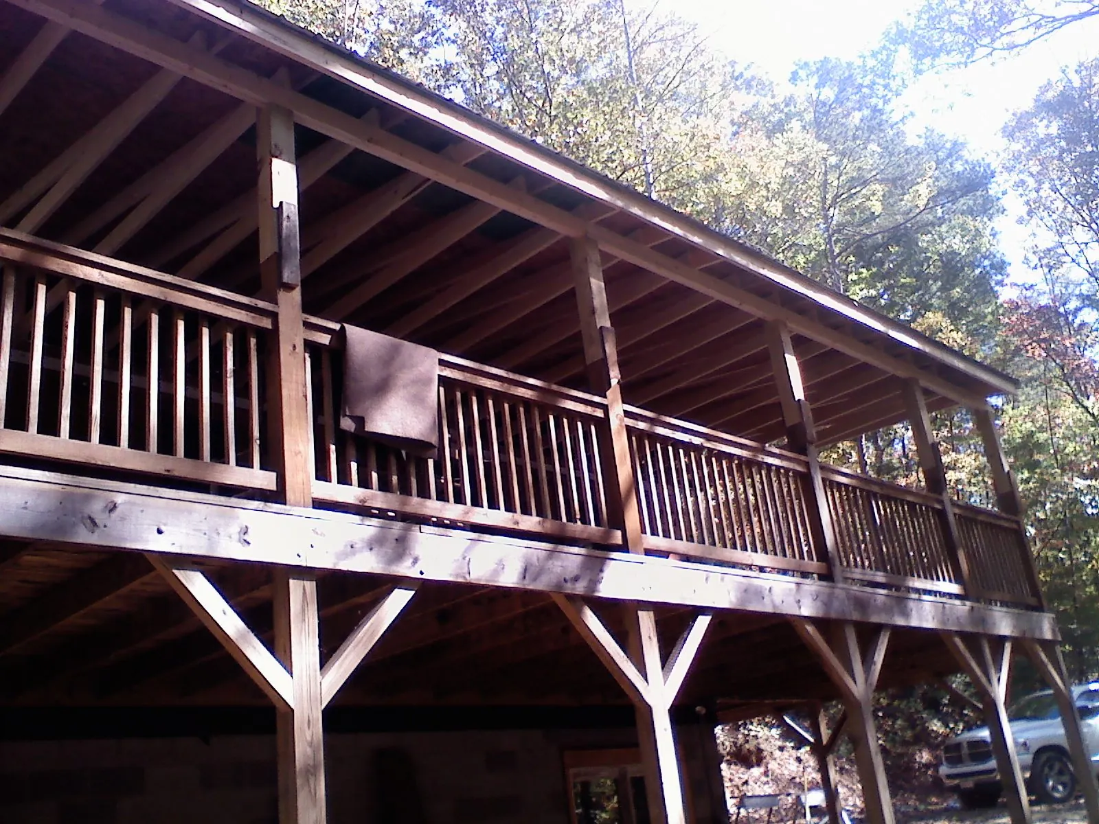 Timber framing under a new elevated porch and deck — Roof Leak Repair in Braintree by Roofing Brothers